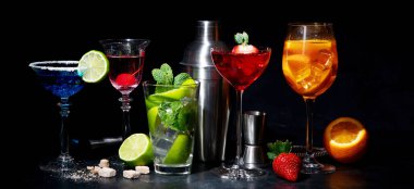 Set of various colorful cocktails on black background. Classic long drink cocktails menu concept