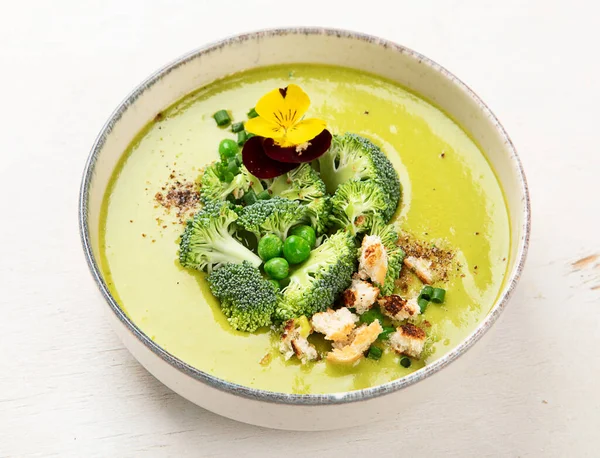 Green soup. Broccoli cream soup. Healthy vegan dish.