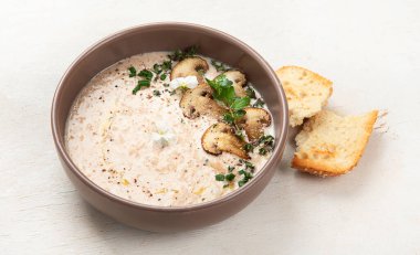 Mushroom cream soup. Healthy vegan dish. Top view clipart