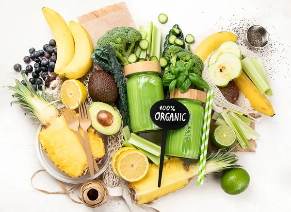 stock image Healthy green smoothie in a eco friendly jar on white background. Zero waste and healthy diet concept