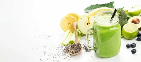 stock image Healthy green smoothie  in a jar mug  on white background.