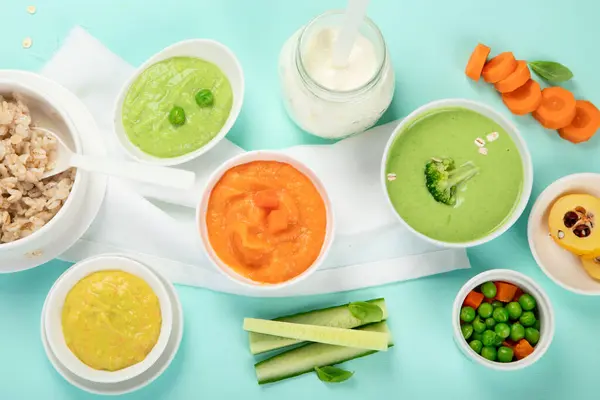 Infant Baby Food Bowls Vegetable Fruit Puree Green Orange Yellow — Stock Photo, Image