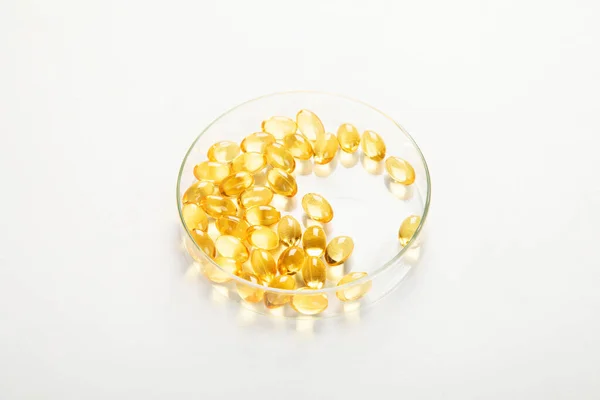 Petri Dish Fish Oil Capsules Concept Vitamin Omega Vitamins White — Stock Photo, Image