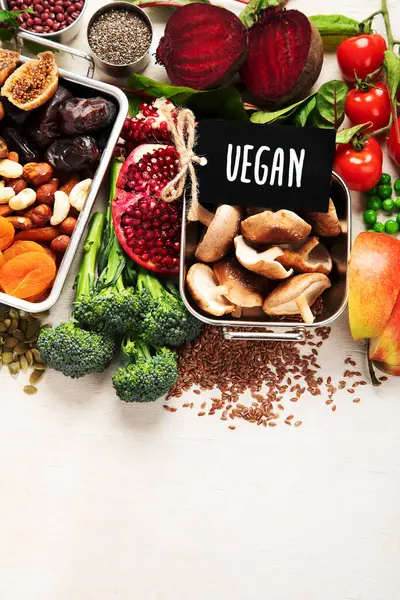 Vegan food rich of iron. Healthy eating. Vegetables, fruits and nuts. Copy space