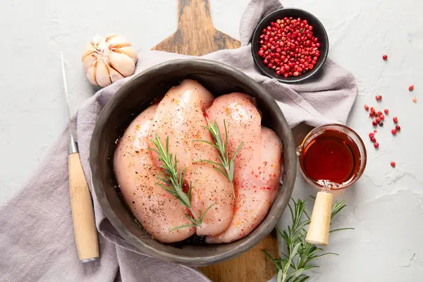 Raw Marinated Chicken Meat Rosemary Sauce Grey Bowl White Background — Stock Photo, Image