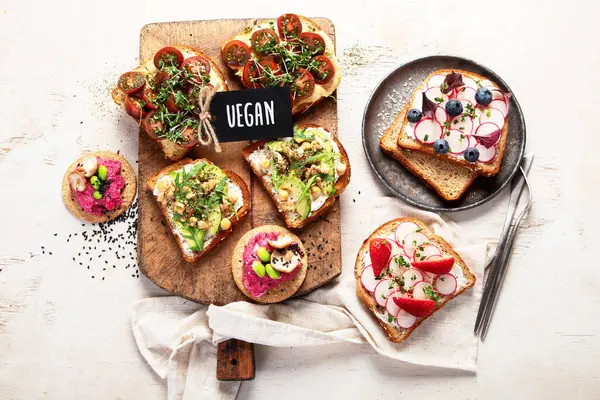 Various Vegan Sandwiches Light Background Healthy Toasts Cheese Avocado Arugula Stock Image