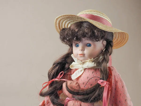 Vintage Porcelain Doll Girl Blue Eyes Brown Braids Pink Dress — Stock Photo, Image