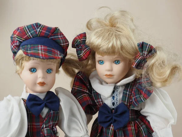 Vintage Porcelain Dolls Two Girls Blond Hair Checkered Suits Porcelain — Stock Photo, Image