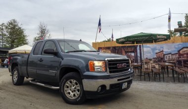 GMC Sierra 1500. Chevrolet Silverado/GMC Sierra is a full-size pickup truck produced since 1999 under the Chevrolet brand, which is owned by General Motors. - A traditional exhibition of American oldtimers began to work in the Pullman City entertainm clipart