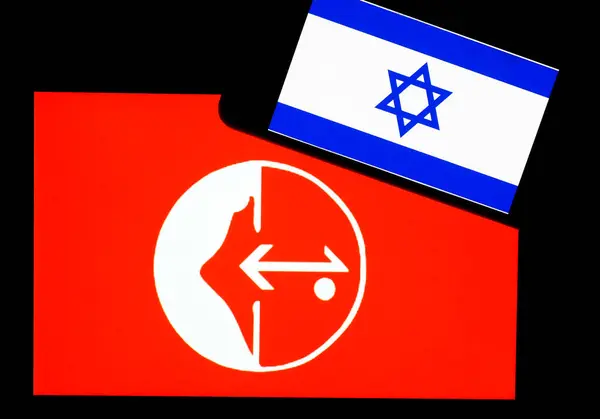 stock image Ukraine - June 19, 2024: In this photo illustration, Israel Flaf  seen displayed on a smartphone and Popular Front for the Liberation of Palestine  logo on  tablet screen. 