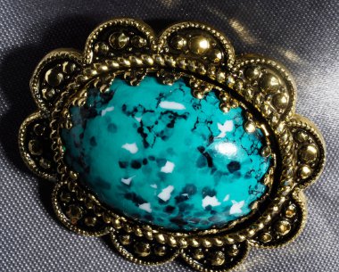 Antique brooch with fake blue stone, made in Germany