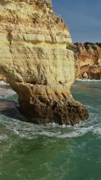 Aerial View Rock Cliffs Waves Praia Marinha Algarve Portugal Vertical — Stockvideo