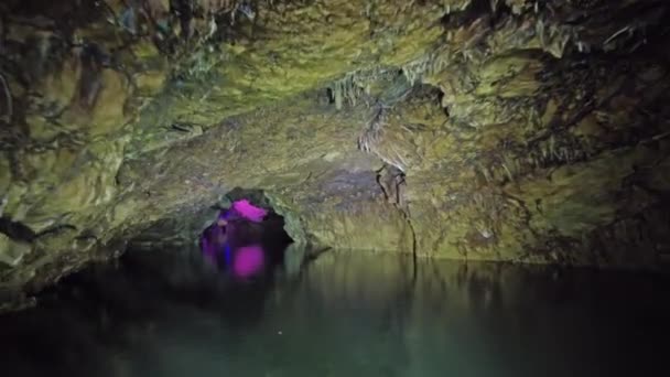 Boating Underground River Dark Stone Cave Magic Multicolor Light — Stock Video