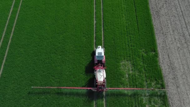 Aerial View Farming Tractor Crop Sprayer Green Field Countryside — Stock Video