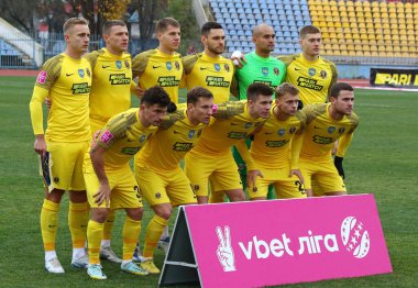 Uzhhorod, Ukraine - November 19, 2022: SC Dnipro-1 players pose for a group photo before the VBET Ukrainian Premier League game against Shakhtar Donetsk at Avanhard stadium in Uzhhorod, Ukraine