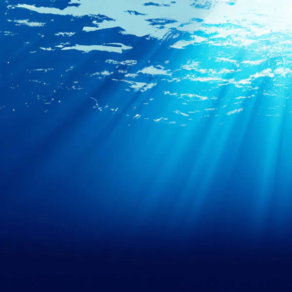 太陽の光が差し込む水中から見る美しい青い海の表面 概要水中の小さな波 — ストック写真