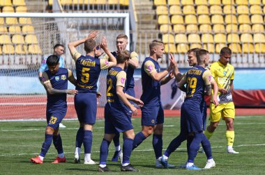 Uzhhorod, Ukrayna - 24 Nisan 2023: SC Dnipro-1 oyuncuları, Uzhhorod 'daki Avanhard Stadyumu' nda oynanan VBET Ukrayna Premier Ligi maçında Rukh Lviv 'e karşı attıkları golü kutladılar.