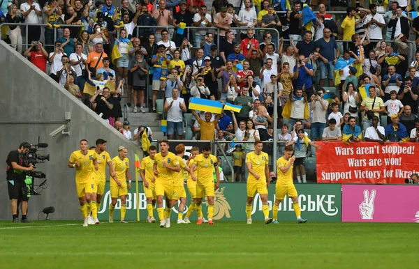 stock image Wroclaw, Poland - September 9, 2023: Ukrainian players celebrate after Oleksandr Zinchenko scored a goal during the UEFA EURO 2024 Qualifying game against England at Tarczynski Arena. Game draw 1-1