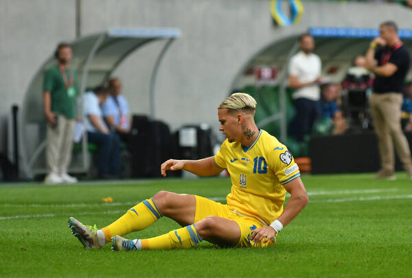 Wroclaw, Poland - September 9, 2023: Mykhailo Mudryk of Ukraine seats on the grass during the UEFA EURO 2024 Qualifying game Ukraine v England at Tarczynski Arena in Wroclaw. Game draw 1-1