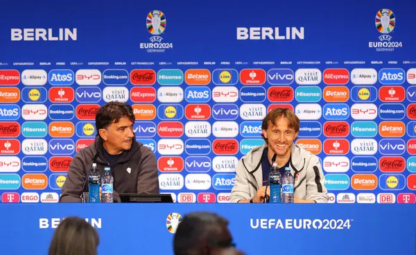 stock image Berlin, Germany - June 14, 2024: Croatian manager Zlatko Dalic and player Luka Modric speak to media during a press conference ahead of the UEFA EURO 2024 group stage match against Spain at Olympiastadion