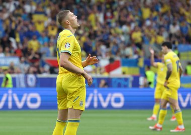 Stuttgart, Germany - June 26, 2024: Artem Dovbyk of Ukraine reacts after not scored a goal during the UEFA EURO 2024 group stage match Ukraine v Belgium at Stuttgart Arena in Stuttgart clipart