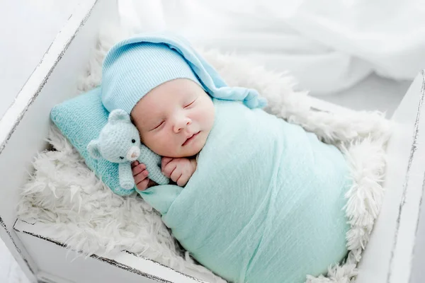 Newborn Baby Child Swaddled Fabric Sleeping Holding Teddy Bear Toy — Zdjęcie stockowe