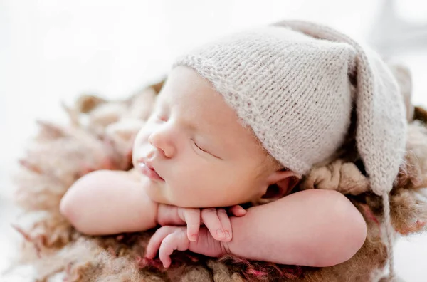 Newborn Baby Child Wearing Hat Sleeping Holding Hands Cheeks Sweet — Stock fotografie