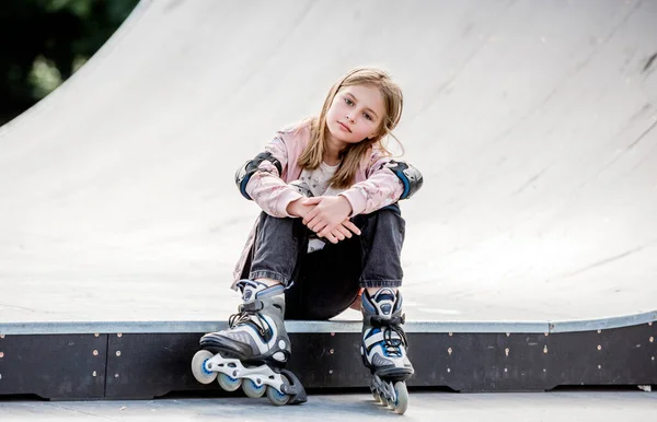 Cute Girl Roller Skater Sitting City Park Looking Camera Pretty — Zdjęcie stockowe