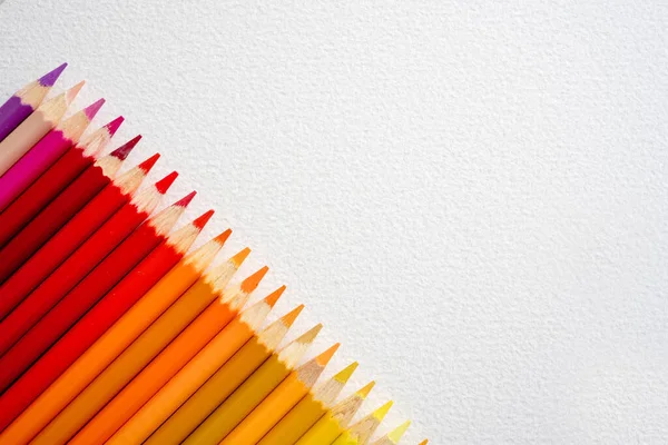 Colorful Pencils Red Orange Set Watercolor Paper Copy Space Closeup — Photo