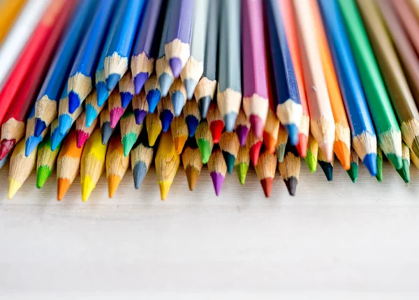 Colorful Pencils Lying Watercolor Paper Closeup Multicolor Crayons Pallete Artist — 스톡 사진