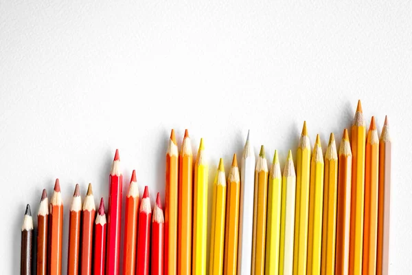 Pencils Yellow Orange Red Color Lying Watercolor Paper Closeup Multicolor — Photo