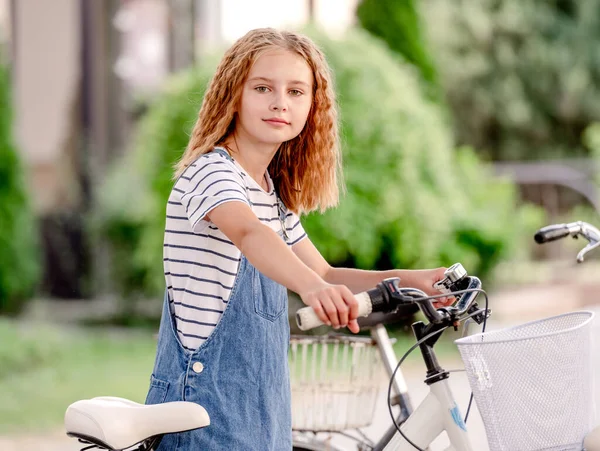 Cute Litte Girl Sitting Parking Kick Scooter Bicycle Parking — стоковое фото