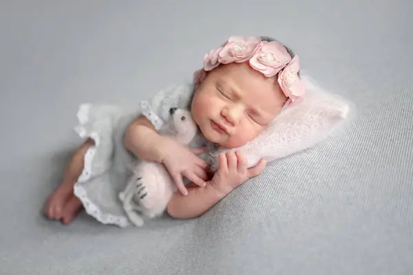 Newborn Girl Sleeps Gray Dress Flamingo Toy Baby Photoshoot Studio — Stock Photo, Image