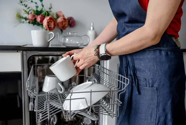 Girl Retrieves Clean Cup Dishwasher Clean Dishes — Stock Photo, Image