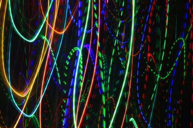 Abstract background with pattern from colorful traces of lights