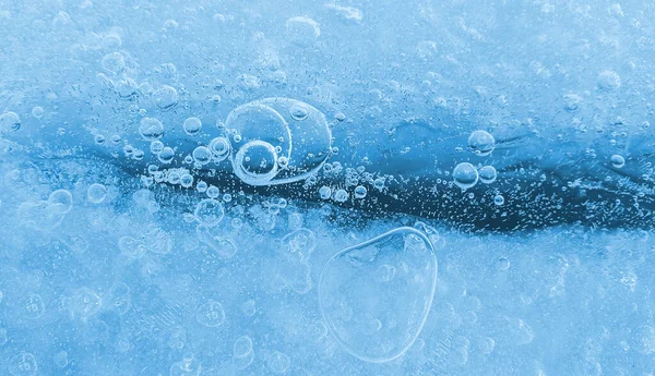 Jégfelület Fagyott Légbuborékokkal Közelkép Természetes Textúrával Jégminta Téli Háttérrel — Stock Fotó
