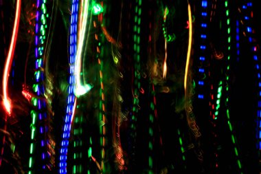 Renkli izlerden ya da ışık yörüngesinden desenli soyut arkaplan