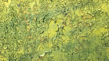 Sarı boyayla boyanmış yıpranmış beton duvarın yakın çekimi 