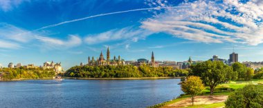 Panorama of Canadian Parliament in Ottawa and river in a sunny day, Canada