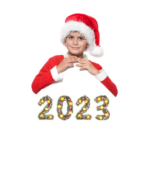 Boy Santa Claus Drží Vánoční Plakát 2023 Číslo Vyrobené Vánoční — Stock fotografie