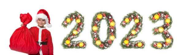 Niño Santa Claus Sosteniendo Saco Navidad 2023 Número Hecho Por —  Fotos de Stock