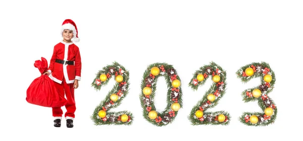 Menino Papai Noel Segurando Saco Natal 2023 Número Feito Por — Fotografia de Stock