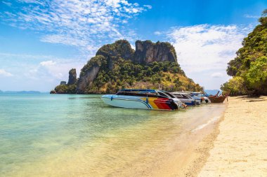 Speedboat at Tropical beach at Koh Phak Bia island in Krabi Province, Thailand