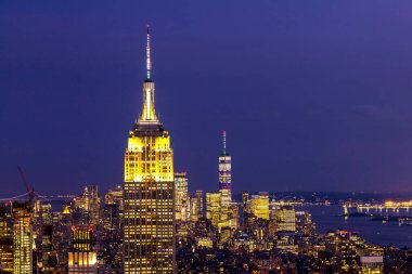NEW YORK CITY, USA - MARCH 15, 2020: Panoramic aerial view of Manhattan at night in New York City, NY, USA