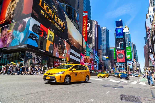 stock image NEW YORK CITY, USA - MARCH 15, 2020: Yellow taxi on Times Square is a symbol of New York City, USA