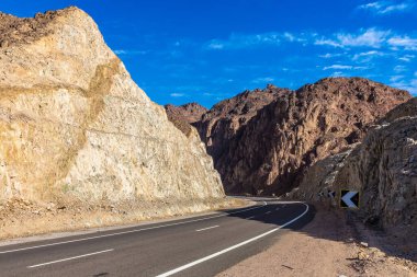 Road in Sahara desert in Egypt in a sunny day