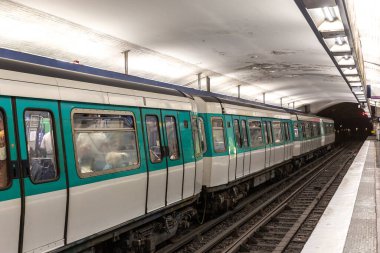 Paris Metro is the one of the largest underground system in the world in Paris in a summer day, France clipart