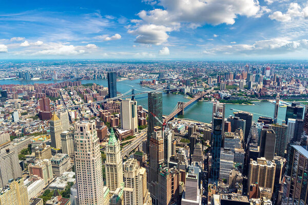 Panoramic aerial view of Brooklyn Bridge and Manhattan Bridge in New York City, NY, USA
