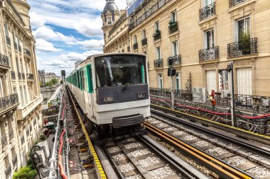 Paris Metro is the one of the largest underground system in the world in Paris in a summer day, France clipart