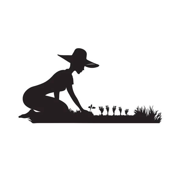 藁帽子の女の子が庭で働いています 庭に秋の植物を植える — ストックベクタ